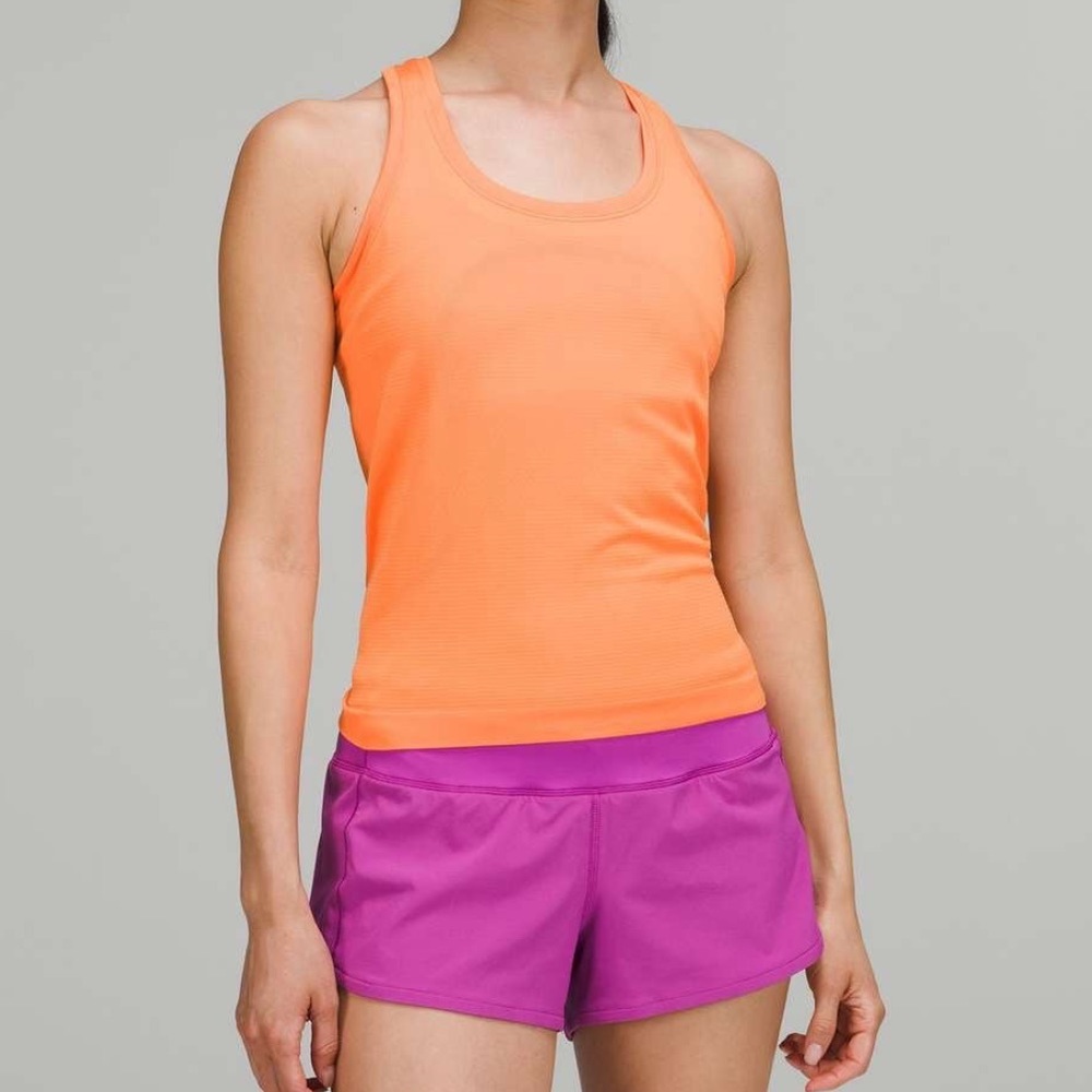 Orange size 14 race length lululemon swiftly tech racer back. Worn once